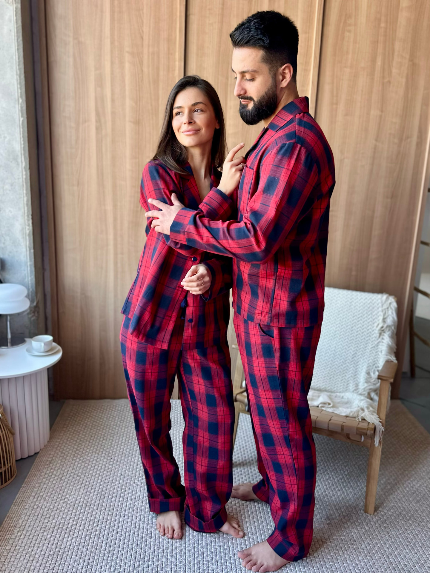 COSY — couple in red checked pajamas